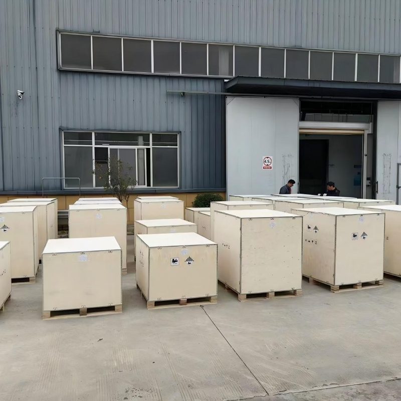 Export crates staged outside the warehouse